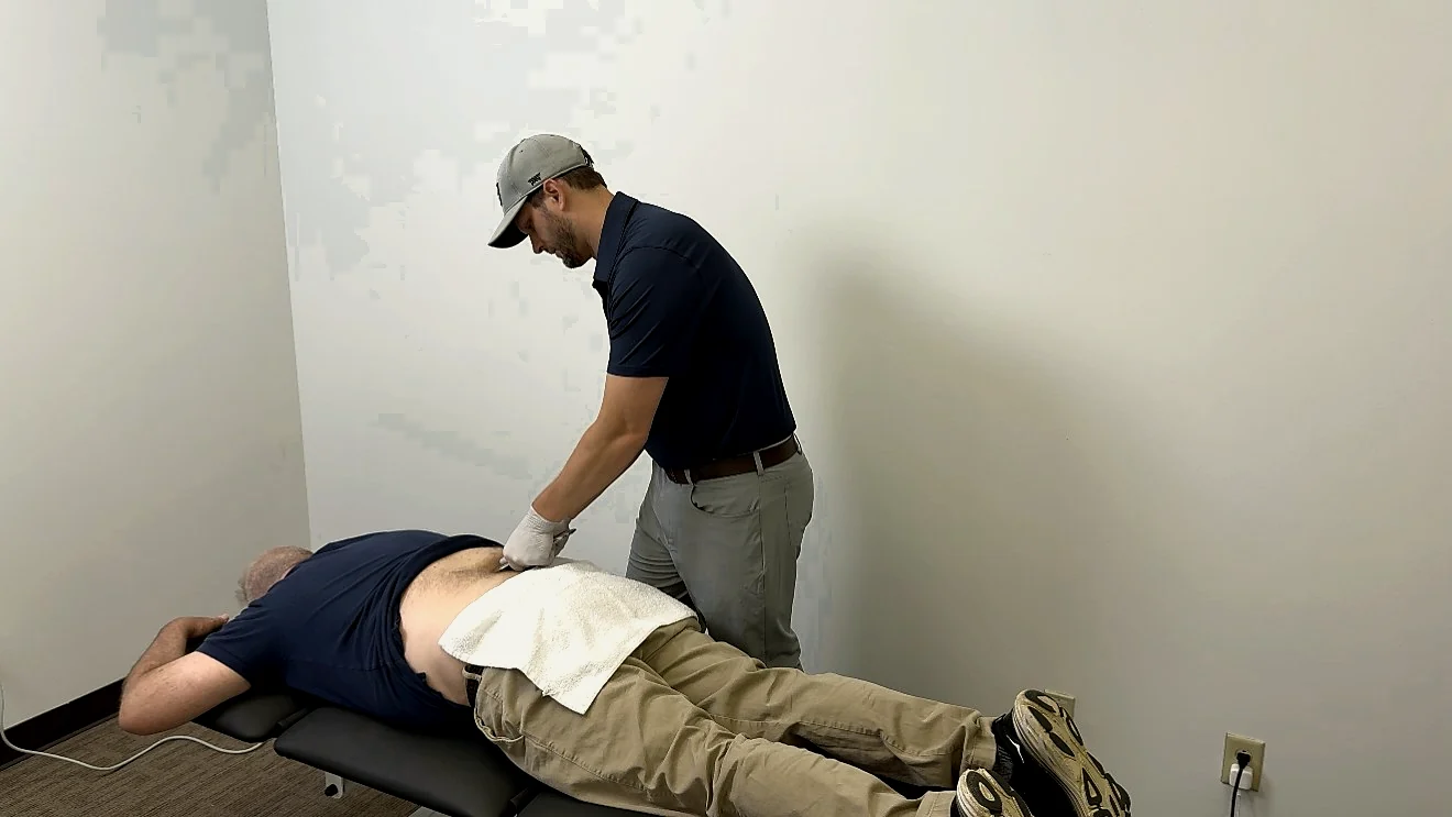 Hands-on physical therapy treatment at Wampler Sports Performance.